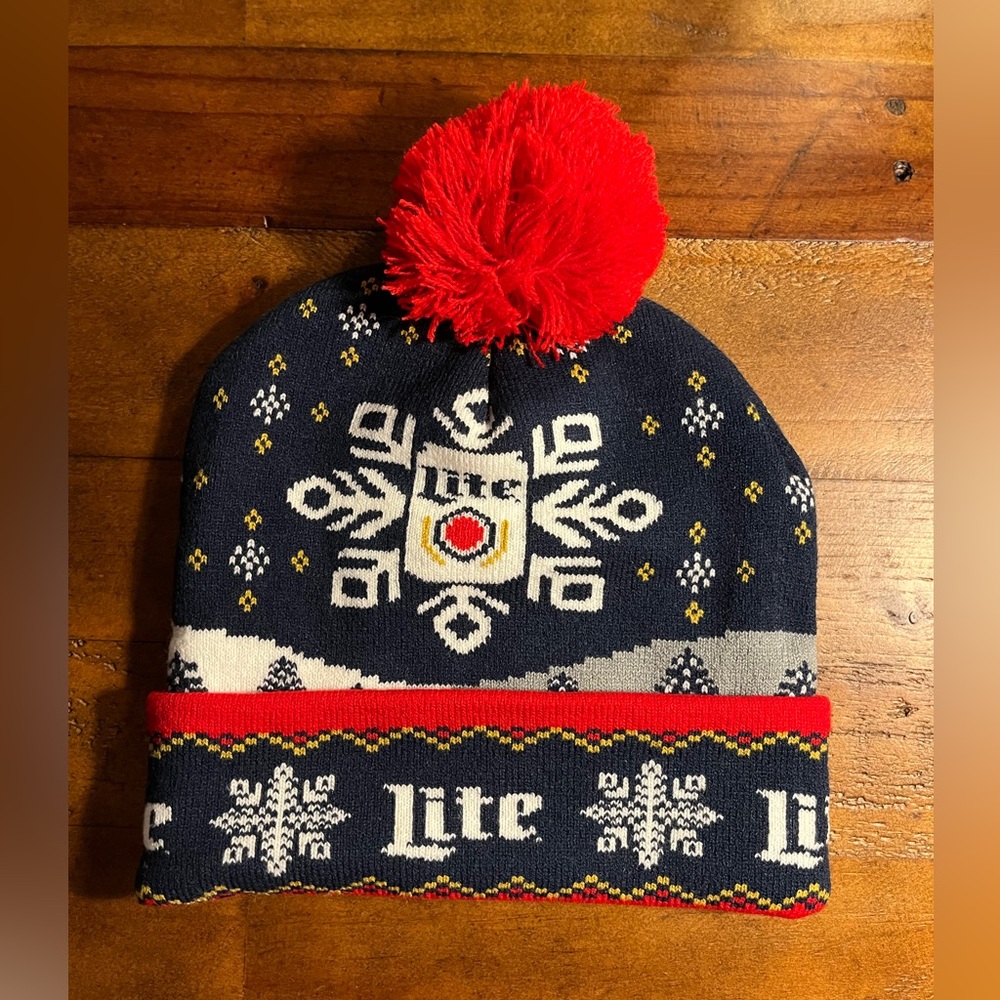 Miller Lite snowflake puffball hat, one size, NWOT.